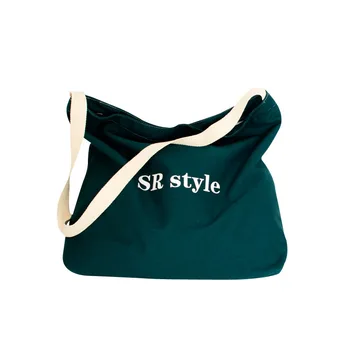 

New simple original large-capacity shoulder messenger canvas bag creative trend ribbon wild green bag three-color into bags