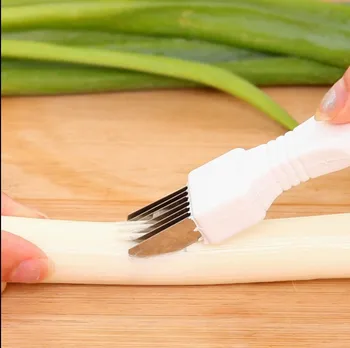 

Creative Onion Cutter Knife Graters Vegetable Tool