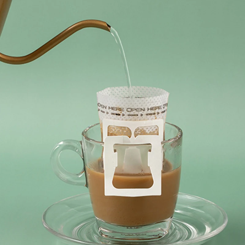 

20pcs/lot Portable Drip Coffee Powder Bags Filter Paper Hanging Ear Drip Bag Filter 7.4*9cm