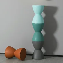Petit tabouret en plastique créatif en sablier, simple et à la mode, chaussures à langer pour petit appartement, pilier rond, table d'appoint rouge