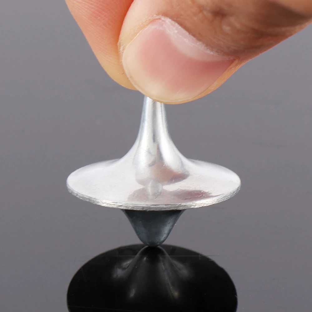 silver spinning top