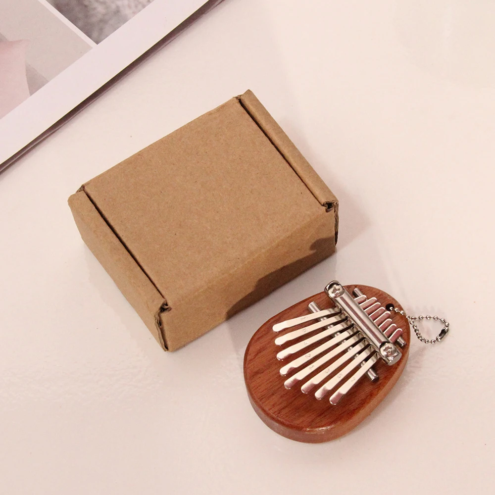 DHinkyoung Mini Kalimba 8 Keys, Portable Mbira Finger Thumb Piano Gifts for  Child and Piano Beginner, Exquisite Marimba Musical Instrument Pendant
