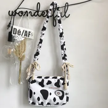 

Korean versatile Cow Print Canvas Shoulder Bag women's bag 2020 new girl's schoolbag cute cartoon messenger bag