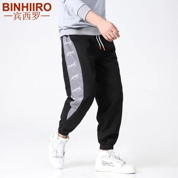 

Men's Casual Pants Spring Summer New Stitching Letter Printing Trousers Men Beam Feet Loose Hip-Hop Jogging Sports Pants male