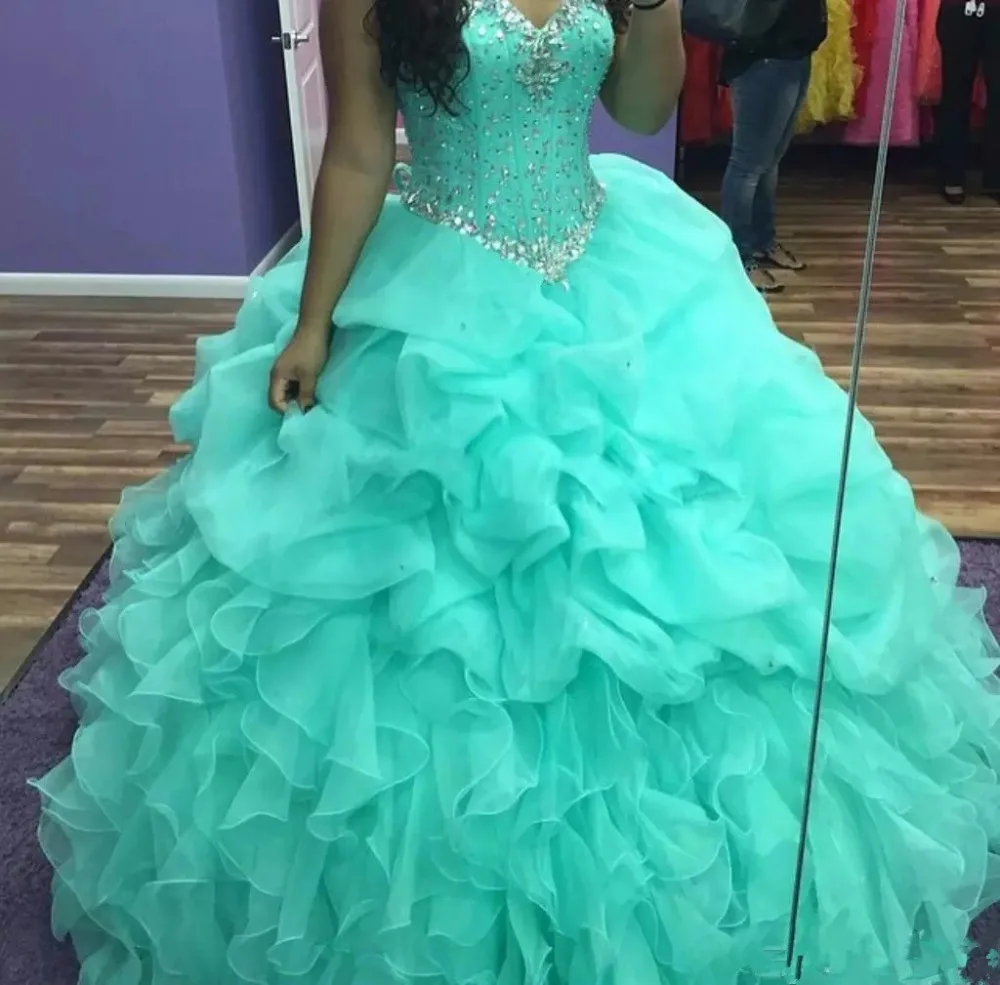 2017-mint-green-quinceanera-ball-gown-dresses-sweetheart-crystal-beaded-puffy-organza-ruffles-tiered-long-sweet-16-party-prom-evening-gowns.webp_