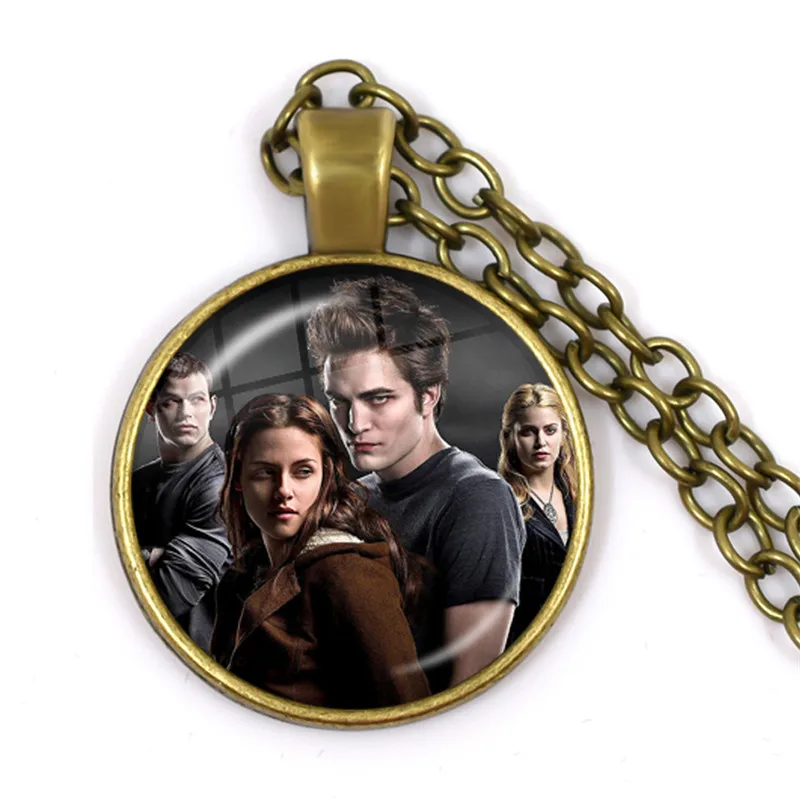 https://ae01.alicdn.com/kf/Hda26e46cd482426990a692aeae4d74c8d/New-Twilight-Movie-Bella-Edward-Jacob-Renesmee-Character-Necklaces-Glass-Dome-Bronze-Pendant-Jewelry-Gifts.jpg