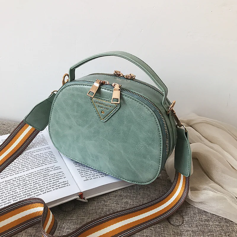 

2019 summer new Korean fashion semi-circular saddle bag simple Joker broadband shoulder slung double portable women
