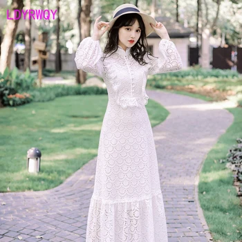 

2019 autumn new Japanese style long white heavy temperament openwork lace dress Lantern Sleeve