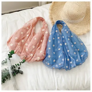 

The new fashionable women's bag in summer 2020 is a soft open handbag that cannot be carried on the shoulder