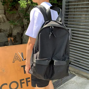 

2020 new high school college student fashion trend super fire men's backpack simple wild couple backpack