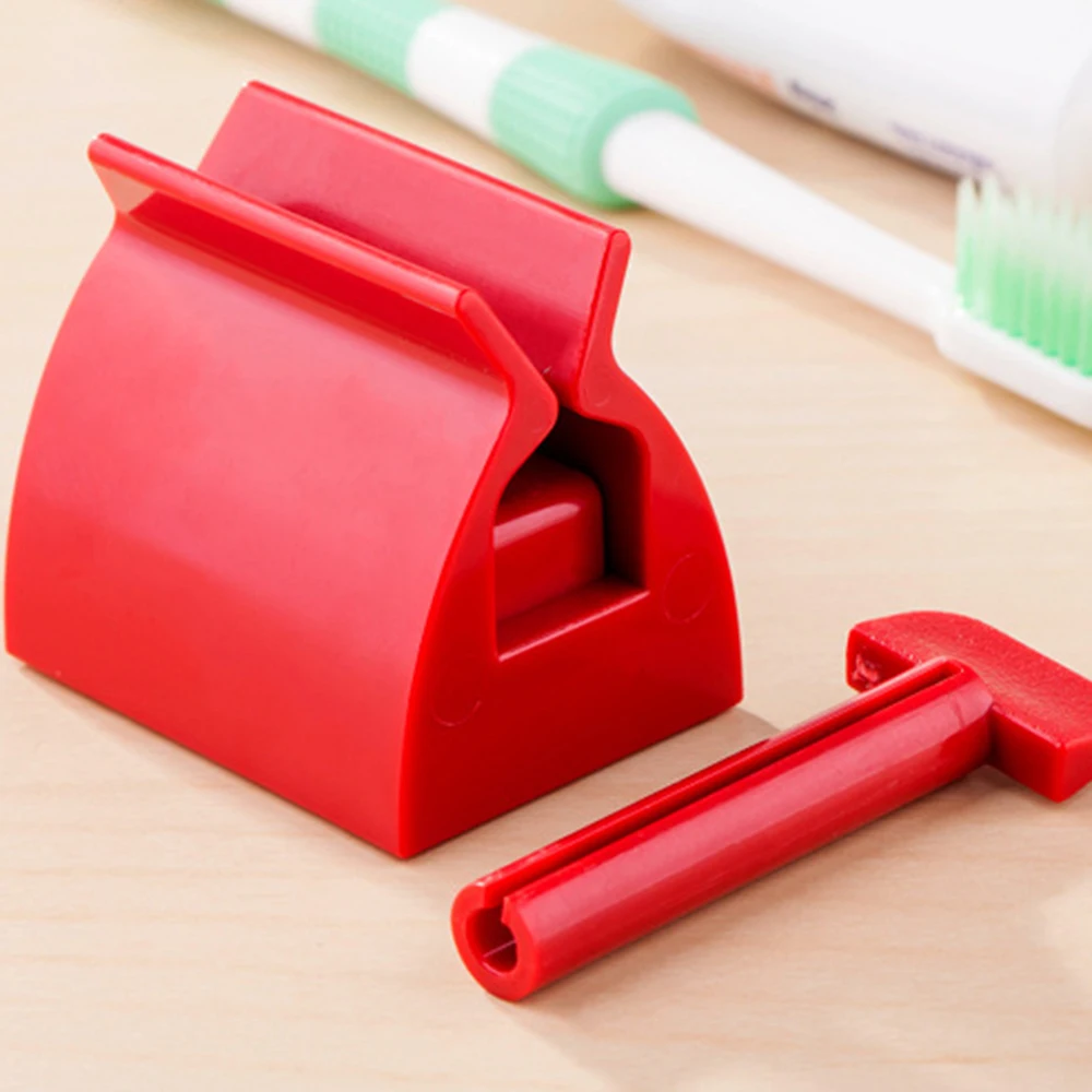 Multifunctional Bathroom Plastic Cream Tube Squeezing Dispenser Rolling Tube Squeezer Tooth Paste Squeezer Toothpaste Dispenser