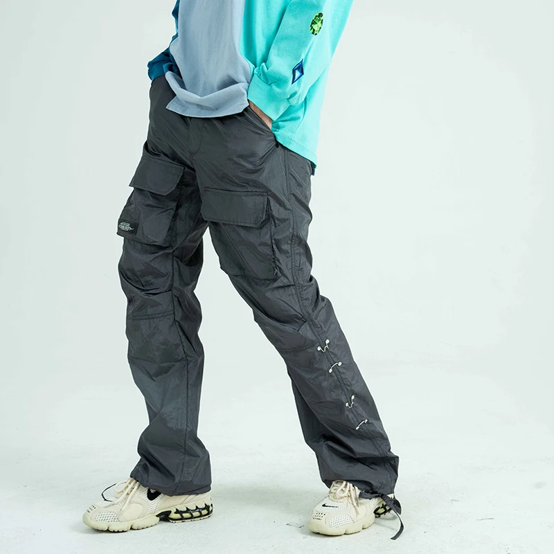 Harajuku Pockets Feet Drawstring Cargo Pants Men and Women Side Button Streetwear Plus Size Casual Trousers Hip Hop Overalls Harajuku Pockets Feet Drawstring Cargo Pants Men and Women Side Button Streetwear Plus Size Casual Trousers Hip Hop Overalls