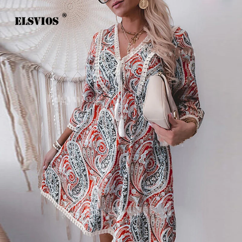 

Женское платье вечерние V-образным вырезом, рукавом 3/4 и бахромой