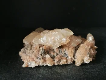 

102.7gMineral samples of natural pink calcite and pyrite Association