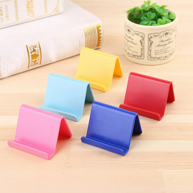 Universal Smart Phone Holder Portable Candy Colors Stand Fixed Holder For IPhone Samsung Huawei Color Random Phone Accessories phone stand for desk