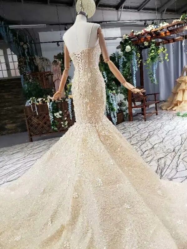 BacklakeGirls Handmade Champagne Mermaid Wedding Dresses Sexy Sleeveless Lace Flower Trumpet Bride Wedding Gowns With Short Cape