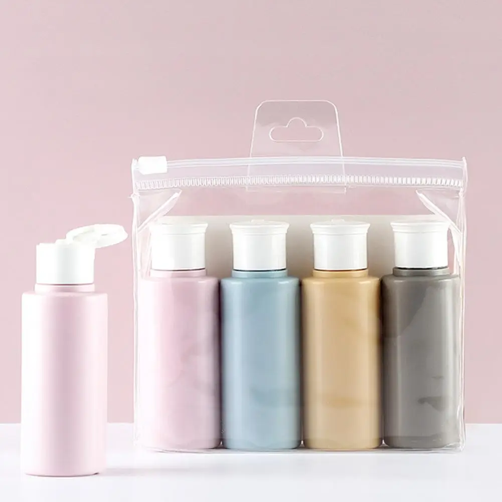 4 Bottles Portable Travel Bottles Set Leak Proof Squeezable Silicon Tubes Travel Size Toiletries Containers Carry 4