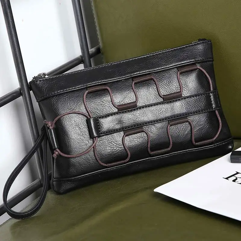 

2019 new hand bag retro hand clutch mobile phone shopping casual fashion bags for men and women Korean version