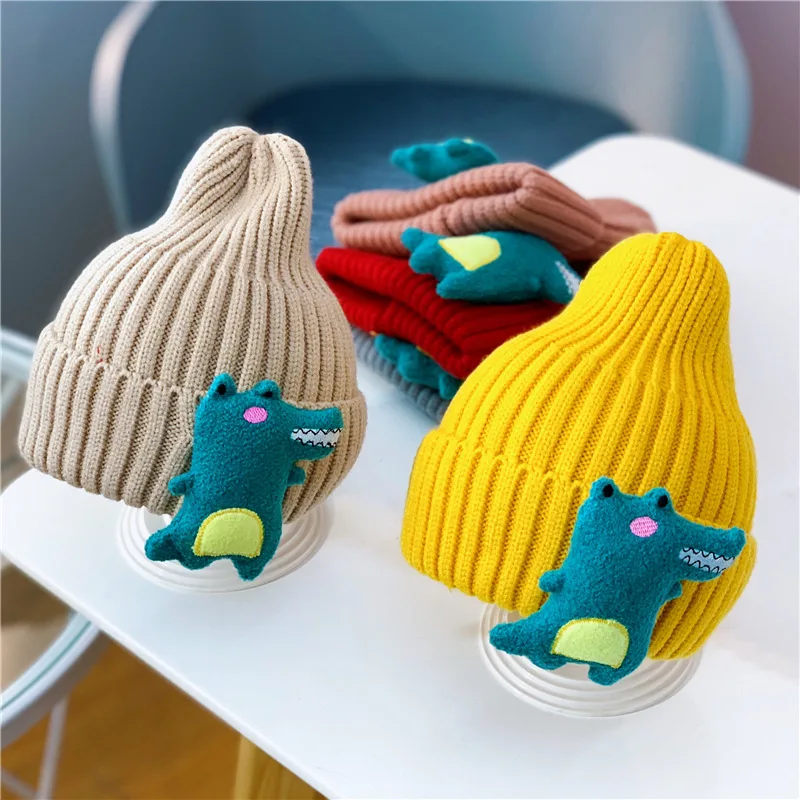 

2021 Winter Cartoon Dinosaur Baby Hat Cute Animal Warm Knitted Female Baby Boy Hat Beanie Stretch Children Hat