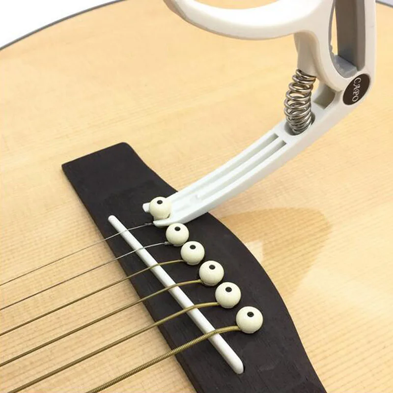Guitar Capo Plastic Guitar Capo for Acoustic Electric Guitars Classic Guitar Capo Ukulele Bridge Pin Puller