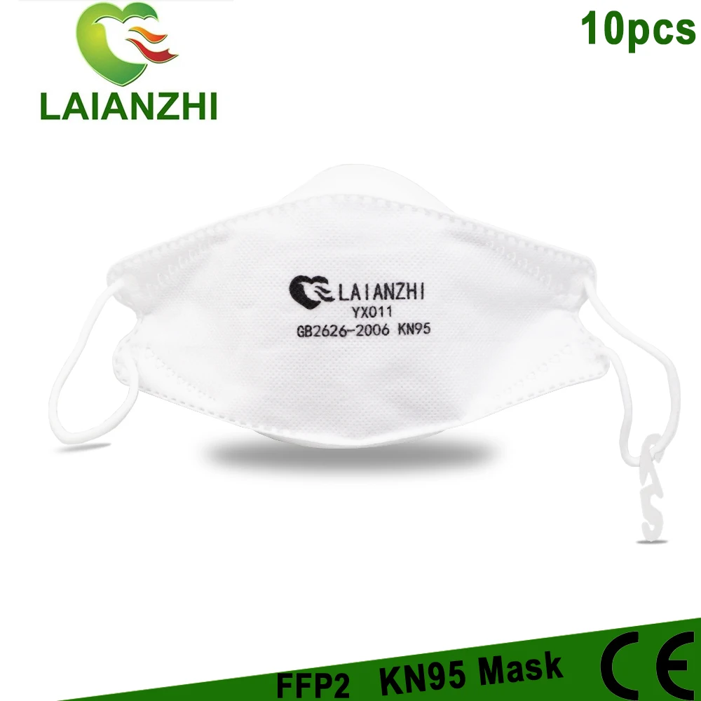 Lot de masques FFP2 blancs empilés, protection respiratoire certifiée.