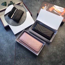 

2022 new men's and women's wallets Large-capacity hand wallet Leather storage wallet Woven leather wallet Pure color hand wallet