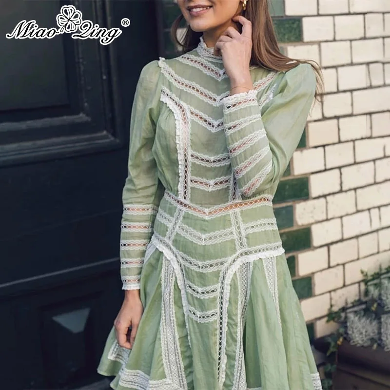 

MIAOQING Women's 2019 summer collection is a hollowed-out high-waisted dress with a standing collar and long sleeves
