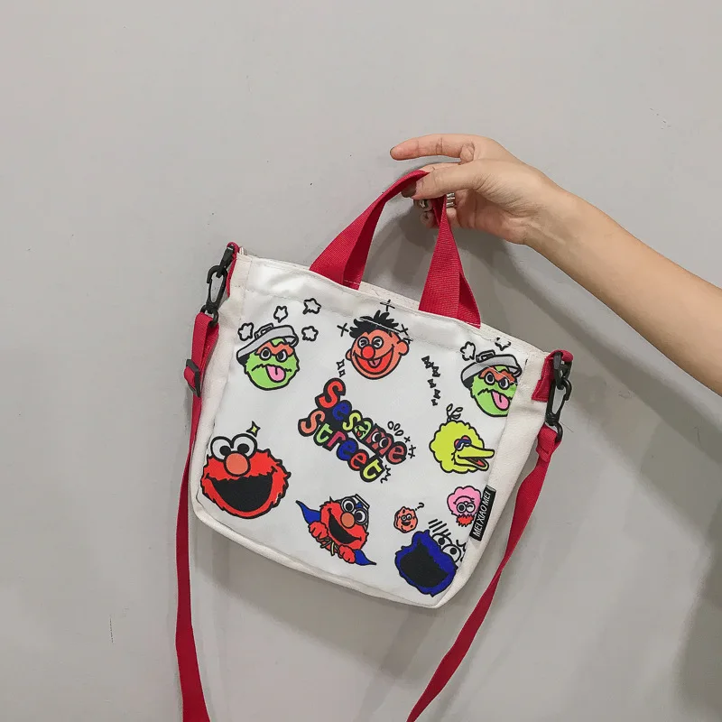 

2020 new female bag canvas bag small messenger bag female Korean version street one shoulder portable Harajuku style cloth bag