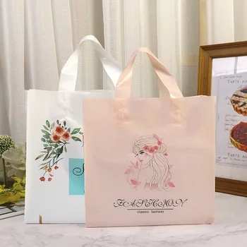 

50pcs/pack Thicken Plastic bag With Handle fashion Boutique Gift Clothing Packaging bag Large Shopping Pouches Multiple Patterns