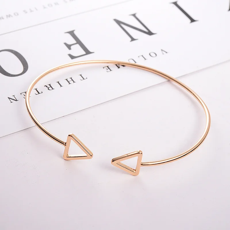 

Han Version Tide Is Tasted Newly Contracted Hollow Out Triangle Geometry Square Modelling Opens Contracted Bracelet Female