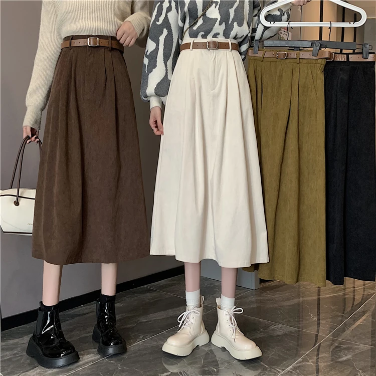

Half skirt children's autumn and winter design sense of minority 2021 new corduroy high waist small black A-line skirt