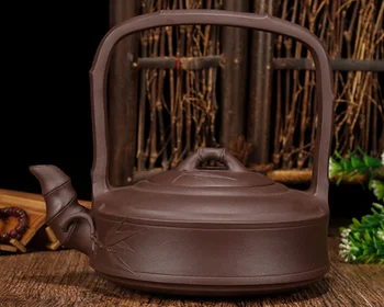 

China Yixing Zisha Purple Clay Handmade Bamboo Joint Loop Handle Pot Teapot600cc