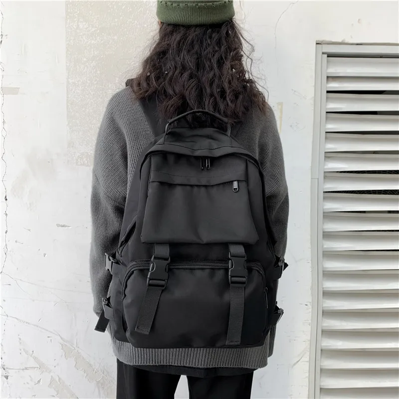 

New Korean Version of The Trend Couple Backpack Fashion Personality Travel Rucksack Multifunctional Schoolbag Mochila Mujer