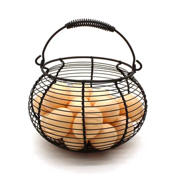 

Rustic Wire Egg Basket with swimming Handle Primitives Vintage Gathering Basket. Rusty