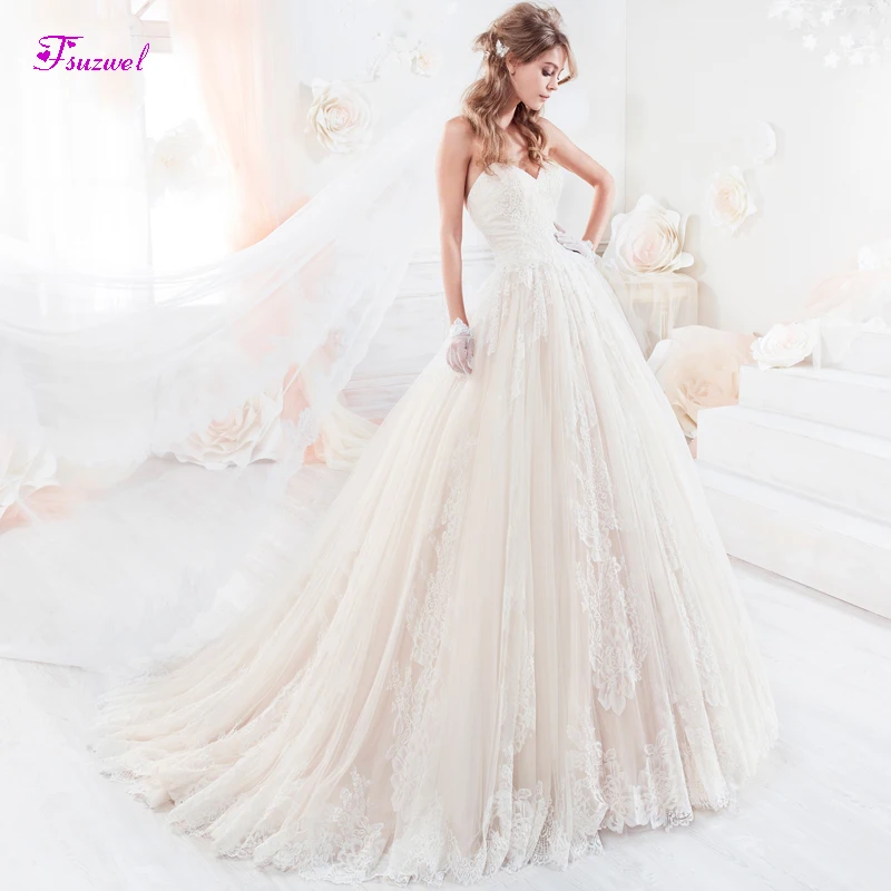 

Fsuzwel New Sexy Strapless Backless A-Line Wedding Dress 2020 Graceful Appliques Lace Court Train Princess Bridal Gown Plus Size