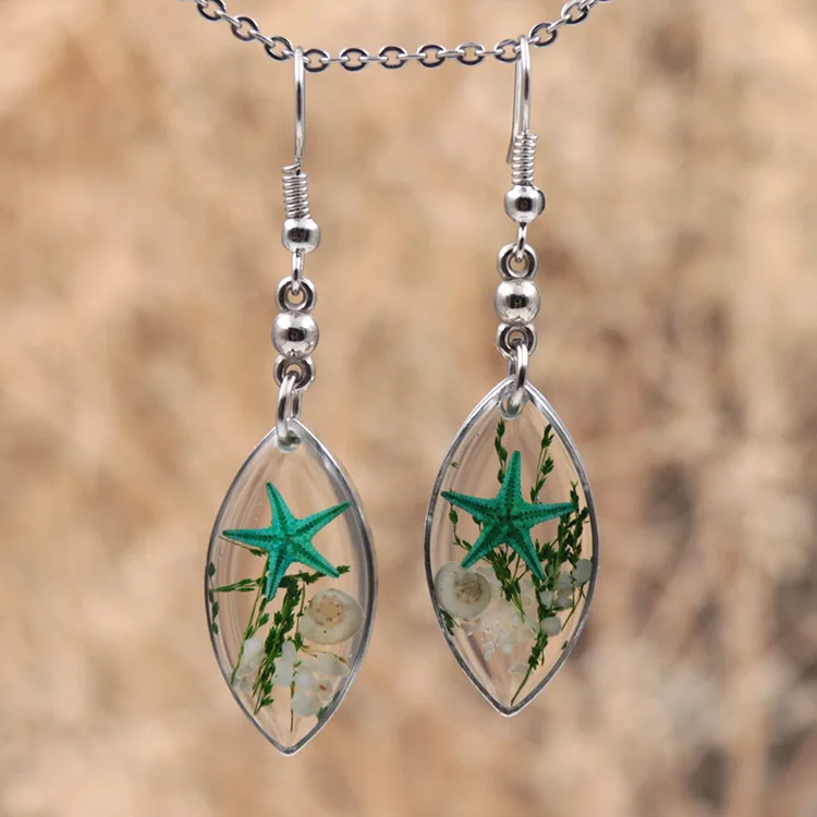

Spindle Resin Epoxy Earrings Transparent Hollow out Metal Selvage Stainless Steel Ear Hook Specimen Color Starfish Earrings