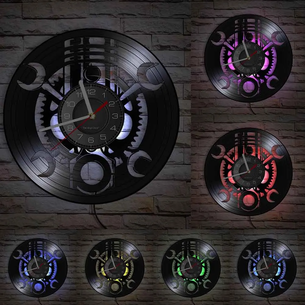 Six Black Record Wall Clocks with mechanical clock designs adorn a brick wall, each featuring illuminated gears and displaying different colored lights.