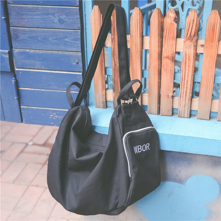 Women Canvas Solid Color Backpack Embroidery Fashion Shoulder Bag Japanese Style Large Capacity Letter Luggage Travel Bag - Цвет: Black