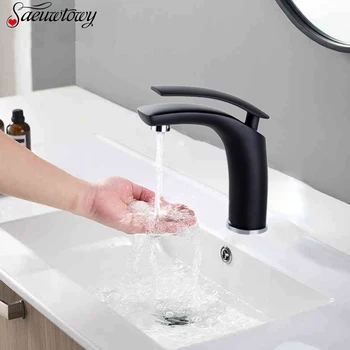 

Saeuwtowy Manufacturing Hot And Cold Basin Faucet Creative Switch Outlet Bathroom Sink Faucet Basin Tap Golden color and white