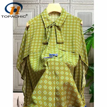 

1.11 2020 Spring New Bow Turn-down collar Off Shoulder Cloak sleeves Plaid Print Contrast color Temperament Silk Blouse