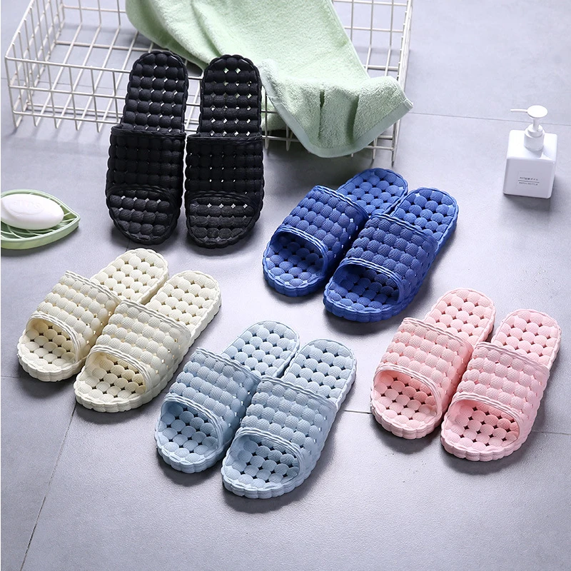 

Home indoor and outdoor PVC couples dot leaking slip non-slip hollow soft bottom couple Korean bathroom slippers
