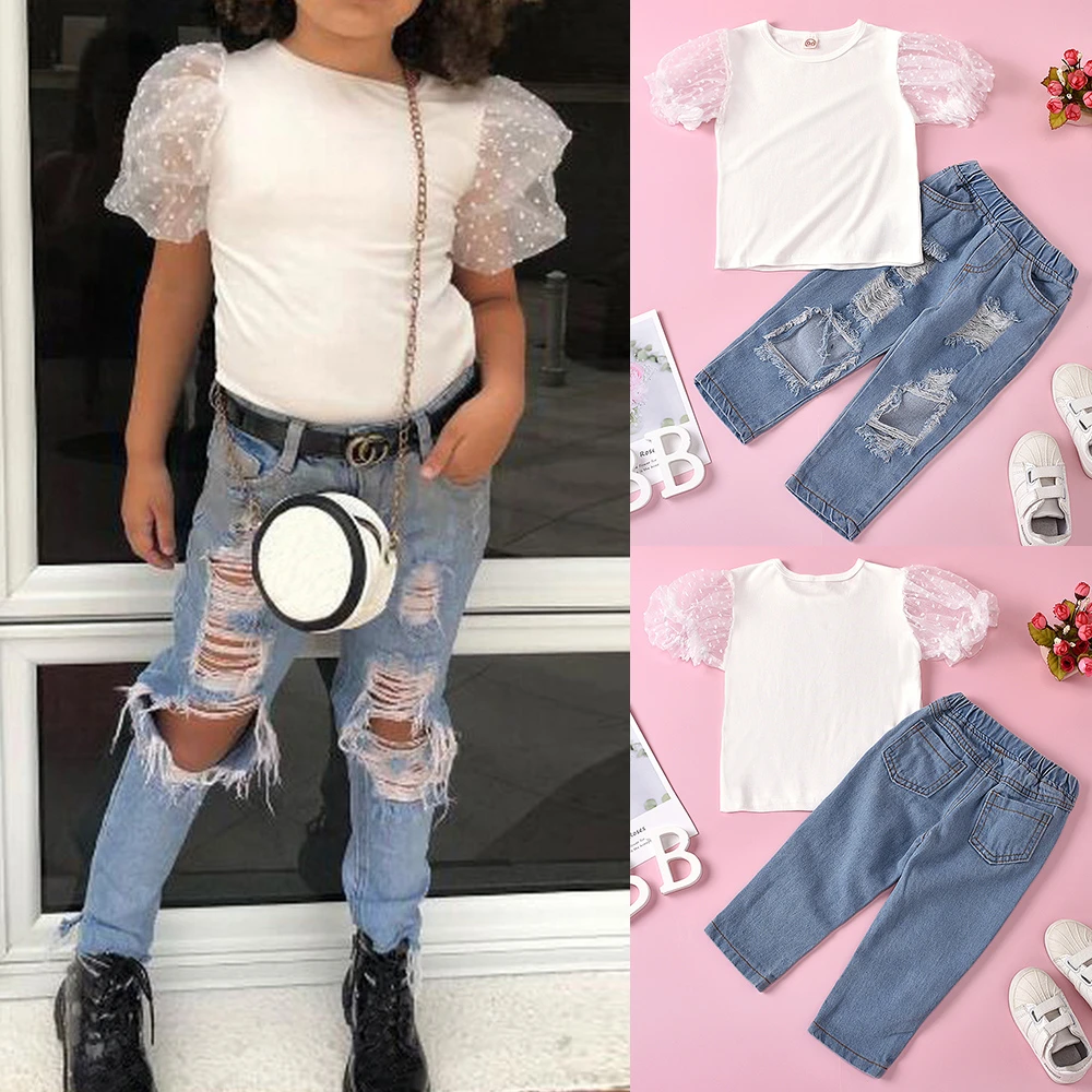 ripped jeans white top