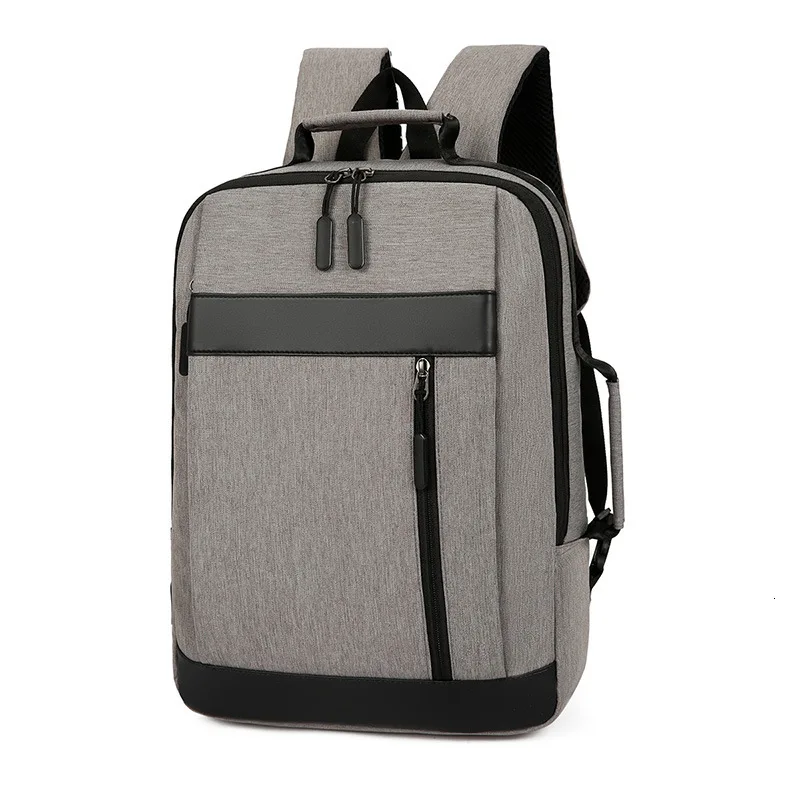 

2019 new student backpack Solid color business computer backpack large capacity USB charging student bag