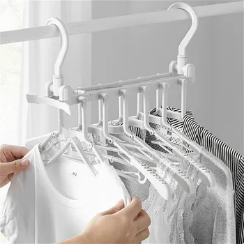 

Magic Clothes Hanger with Clips Trousers Pants Belt Holder Hangers Telescopic Folding Saving Space Drying Rack Closet Organizer