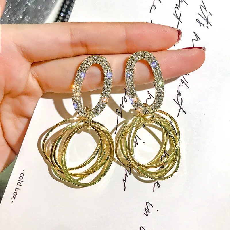 

S925 silver needle European and American fashion exaggerated round earrings temperament long metal ring earrings net red