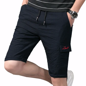 

Korea Style Shorts Men 2020 Summer Slim Compression Shorts Homme Polyester Beach Shorts Male Soild Knee Length Short Pant M-4XL