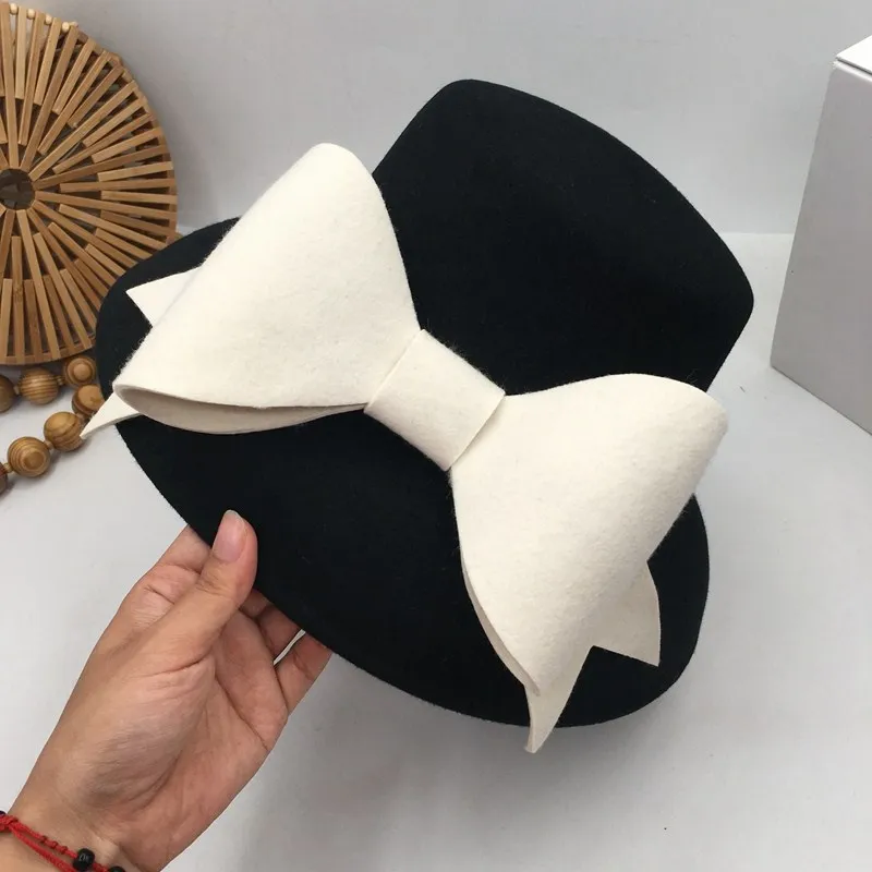 

British socialite Hepburn wind small big brim fashion show face basin hat bowknot Japanese female qiu dong small fisherman