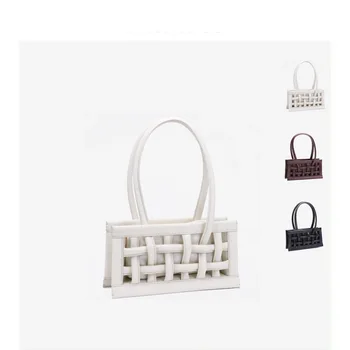 

2020 New Niche Design Woven Female Handbag Handbag Cowhide Leather Armpit Bag Ins Super Fire
