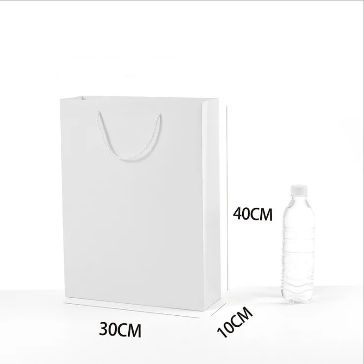 30x40x10cm 10 шт./партия подарочные пакеты для одежды книги упаковка бумажная коробка сумки Подарочный пакет из крафт-бумаги с ручками высокого класса белые бумажные пакеты - Цвет: 30x40x10cm