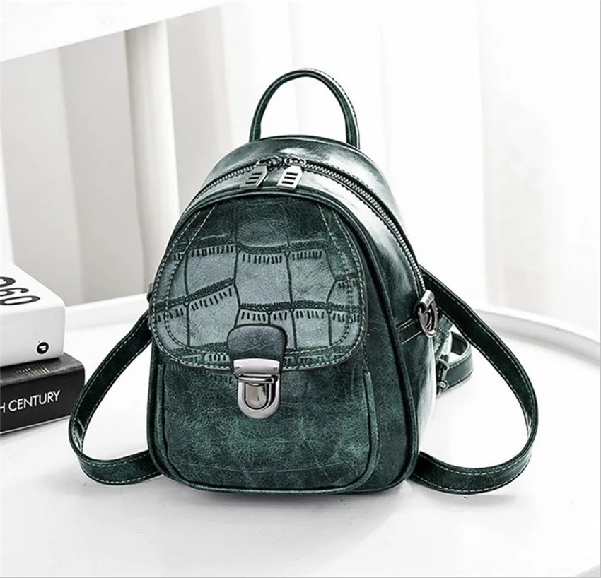 crocodile print backpack